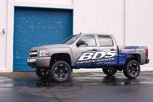 BDS Suspension 6-inch lift kit for 2007-2013 GM 1500 trucks, showing lifted vehicle with large tires and suspension components.