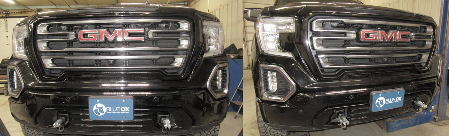Blue Ox tow bar baseplate for 2019-2026 GMC 1500 trucks, sturdy metal construction with mounting points for towing accessories.