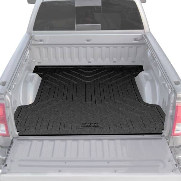 Husky Liners rubber bed mat for 2019-2026 RAM 1500 5'7" truck bed, durable black rubber liner with textured surface.