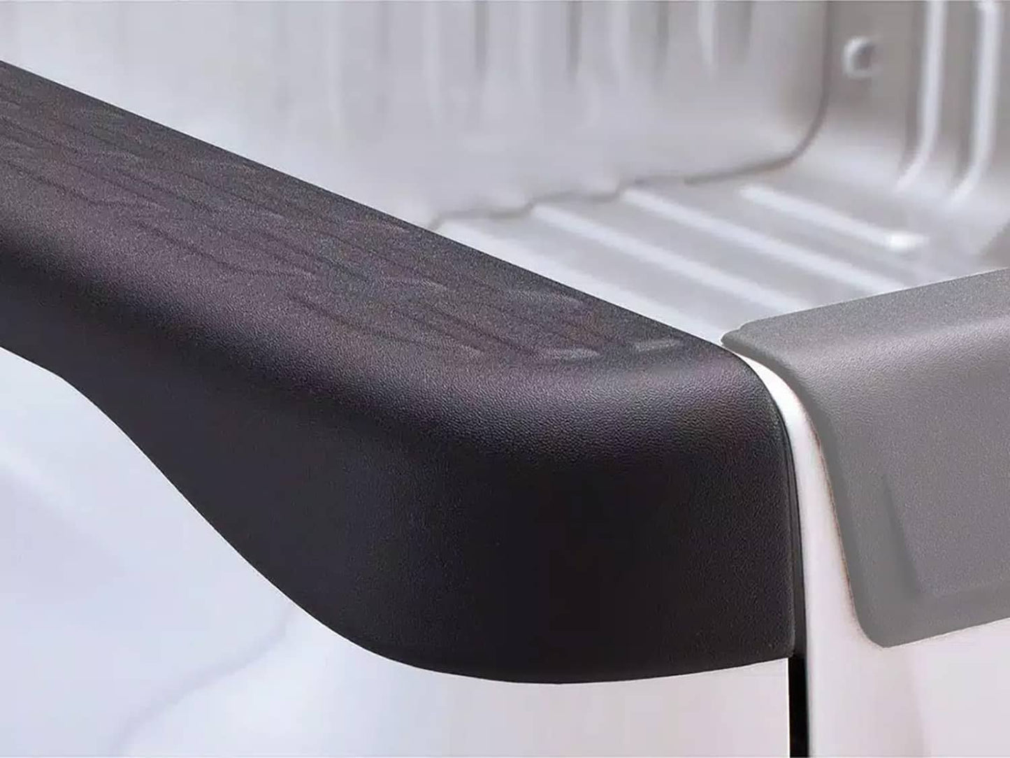 Husky Liners OE style bed caps without stake pockets for 2007-2013 GMC 1500 and 2007-2014 HD 8-foot trucks, shown on vehicle bed.