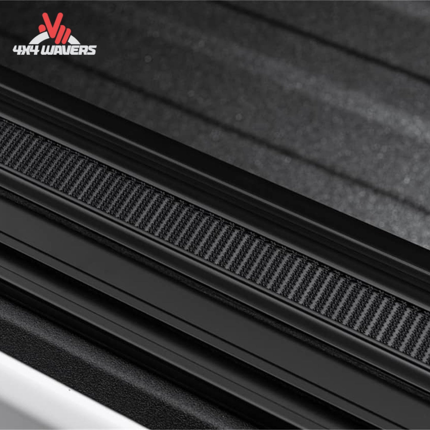 Close-up showing woven canvas bonded to interlocking aluminum slats for security and durability