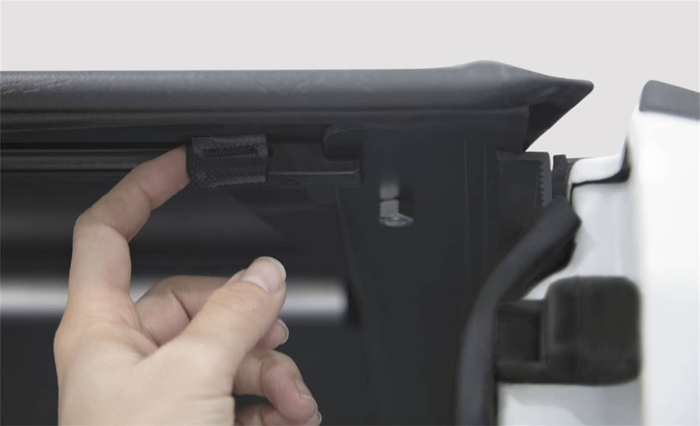 ACI Access Cover Lite Rider tonneau cover for 2007-2013 Chevy Silverado 1500 5.5-foot bed, shown installed on truck bed.