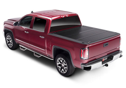 Black BAK FiberMax box cover for 14-18 GM 1500 5'8" trucks, durable tonneau cover with textured surface.