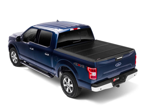 Black BAK Industries Fibermax Box Cover for 2015-2020 Ford F150 5.5-foot bed, durable tonneau cover for truck bed security.