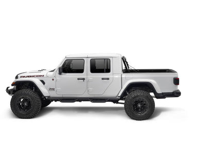 Matte aluminum BAKFlip MX4 hard folding tonneau cover on Jeep Gladiator 5ft bed, features tailgate lock and 400lb capacity