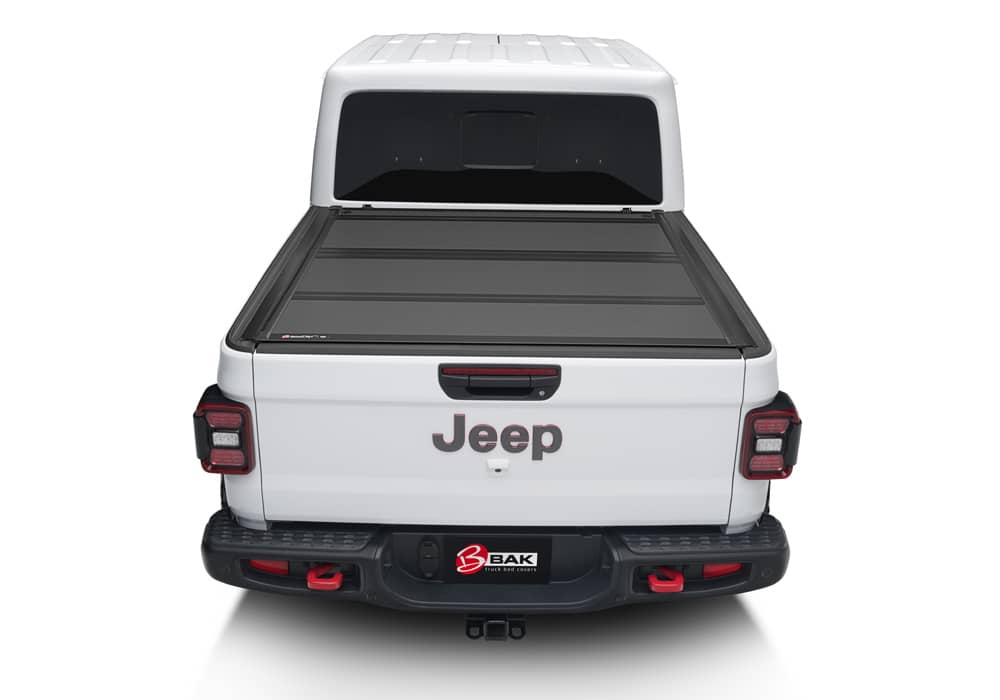 BAK MX4 matte aluminum hard folding tonneau cover on Jeep Gladiator 5ft bed, with tailgate lock system and 400lb capacity