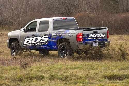 BDS Suspension 6-inch lift kit for 2007-2013 GM 1500 trucks, showing lifted truck with new suspension components.