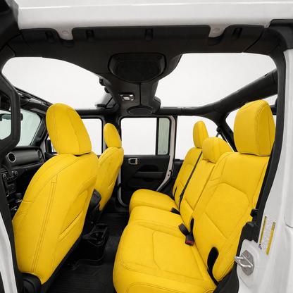 Bright yellow custom leather seat covers for Jeep interior by OFFactory.