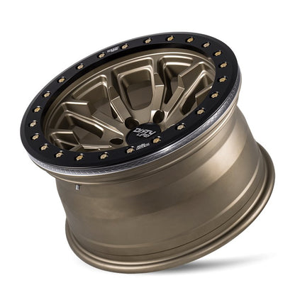 Dirty Life DT-1 9303 satin bronze 17x9 inch off-road wheel with 5-127 bolt pattern and -12mm offset, 78.1mm center bore.