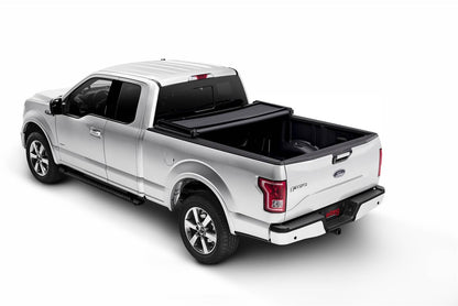 Extang BOX CVR 09-14 F150 5.5' tonneau cover installed on a pickup truck, protecting the truck bed from weather and debris.