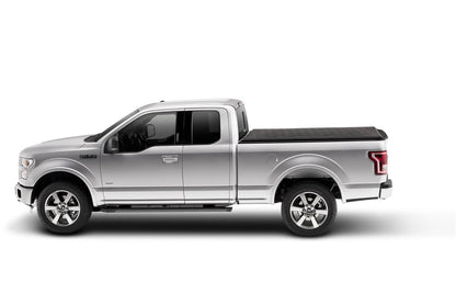 Extang Box CVR 09-14 F150 5.5' tonneau cover installed on pickup truck, protective bed cover with sleek design