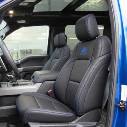 Ford truck cabin with full OFFactory leather seat cover kit covering seats, headrests and armrest.