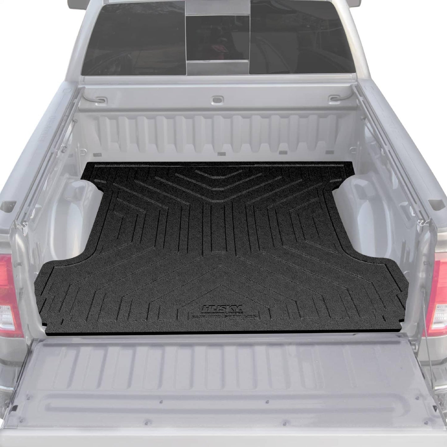 Husky Liners rubber bed mat for Ram 1500, 2500, and 3500 trucks, fits 6'4" bed, durable protective liner in black.