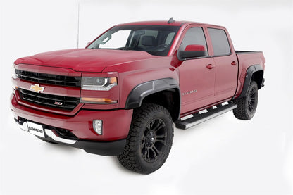 Set of four Husky Liners DRT Fender Flares for Chevy 1500 6.5/8' models, designed to enhance truck appearance and protection.