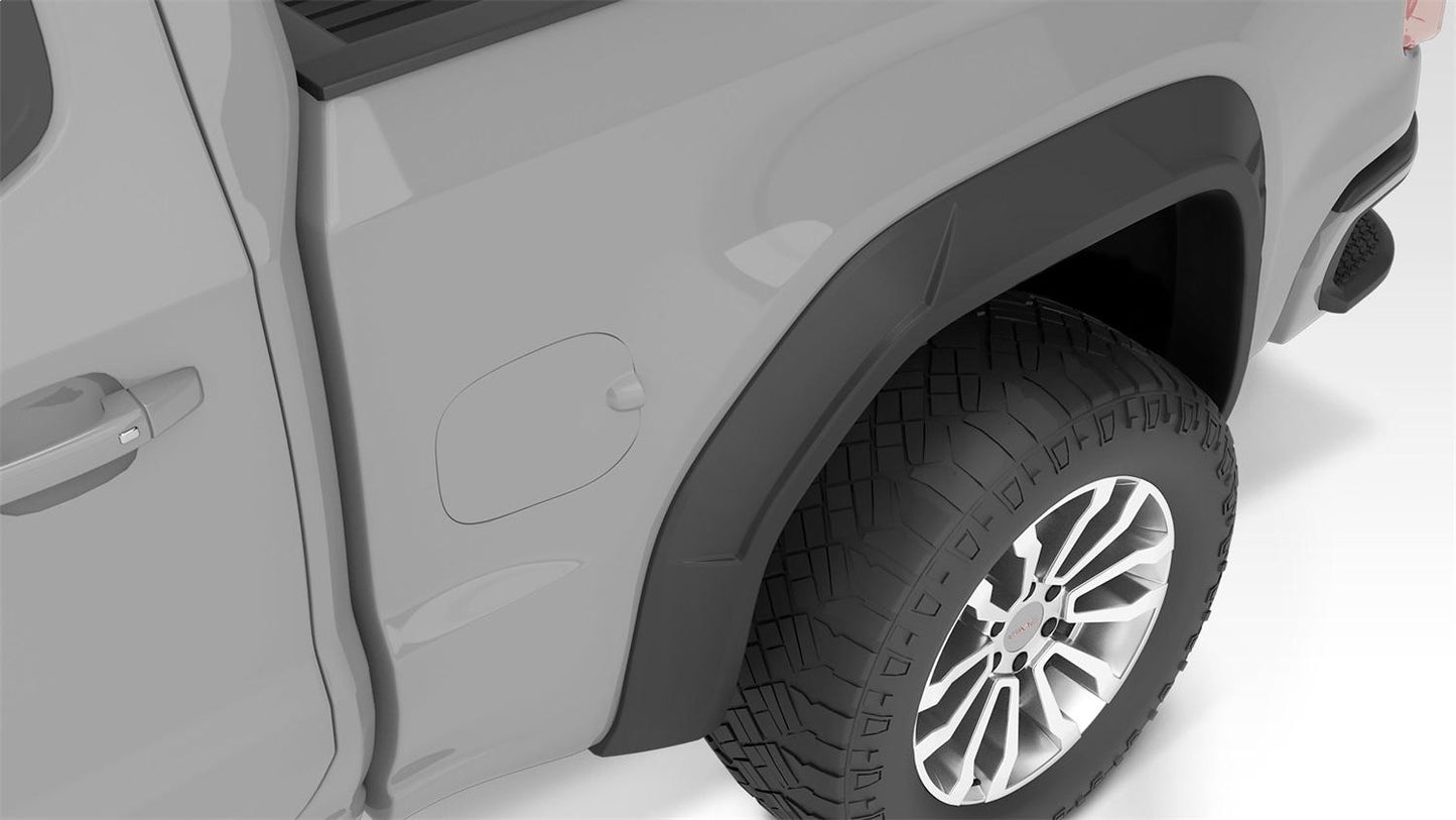 Husky Liners flare set for GMC 1500 trucks, 19-26 model, four fender flares with black finish, designed for truck protection and style.