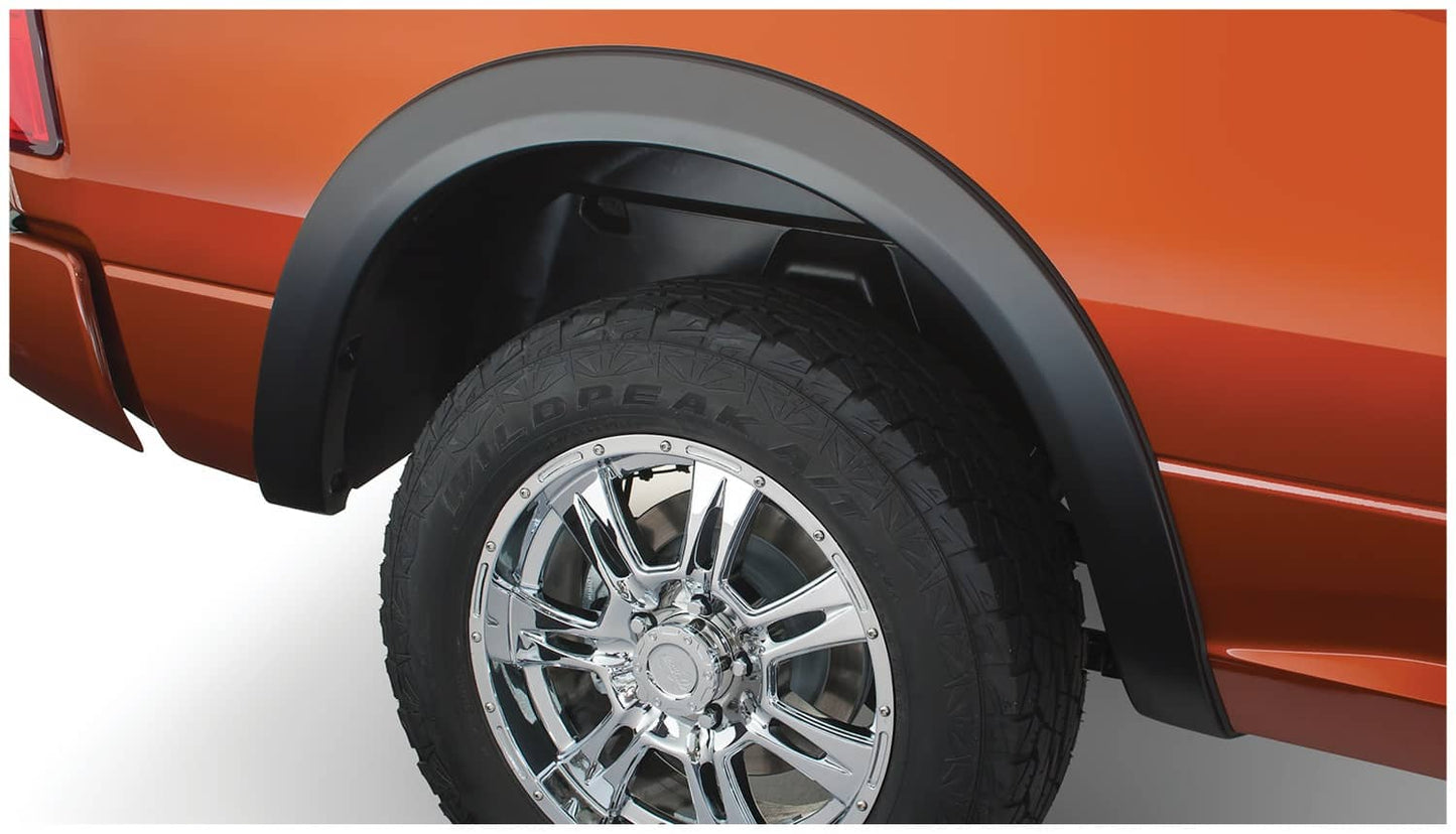Husky Liners OE style fender flares for 2009-2018 and 2019-2024 RAM 1500 trucks, shown in black on a vehicle.