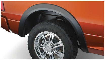 Husky Liners OE style fender flares for 2009-2018 and 2019-2024 RAM 1500 trucks, shown in black on a vehicle.