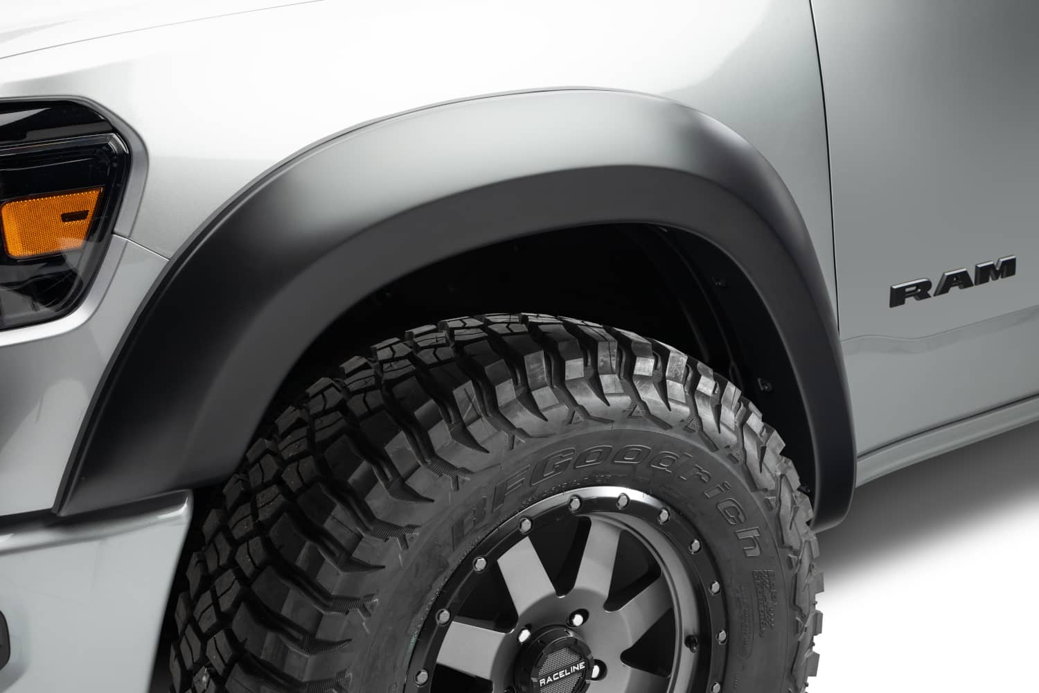 Husky Liners Extend-A-Fender Flares for 2019-2024 RAM 1500, set of four, excluding Rebel and TRX models, mounted on truck.