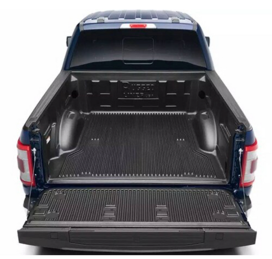 Rugged Liner bed liner kit for Ford F150 6'5" with Pro Power Onboard, durable truck bed mat and liner installed in a pickup truck.