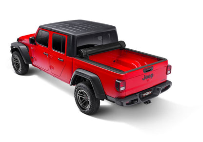 Truxedo Box Cover for 20-26 Gladiator pickup truck, black tonneau cover with secure latch system, installed on truck bed.