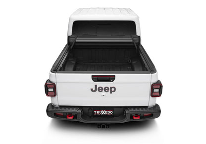 Truxedo SENTRY CT tonneau cover for 20-26 Gladiator trucks, black, weather-resistant, installed over truck bed for protection and style.