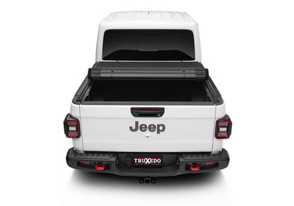 TruXedo SENTRY CT tonneau cover for 20-26 Gladiator trucks, black fabric with sleek design and secure side rails.