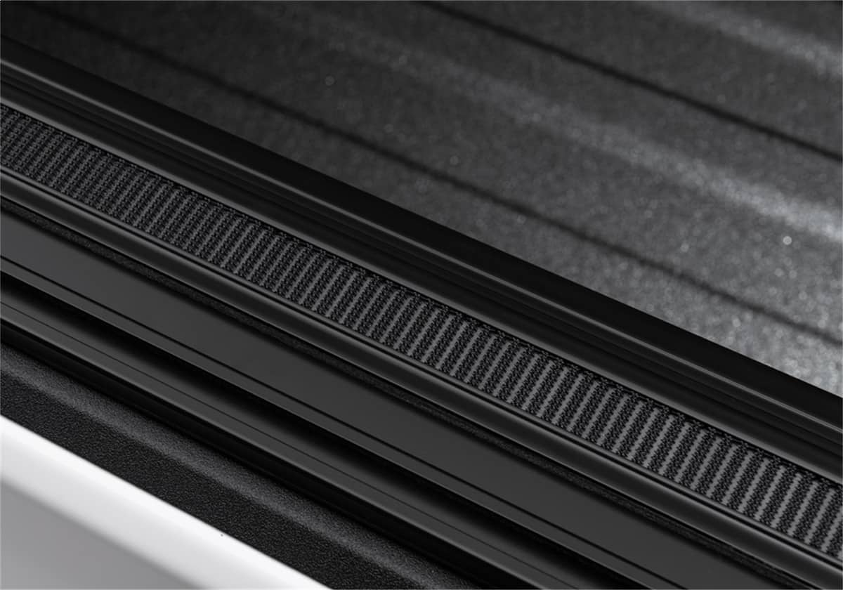 Truxedo SENTRY CT tonneau cover for 20-26 Gladiator truck, shown folded on a pickup bed for secure bed protection.