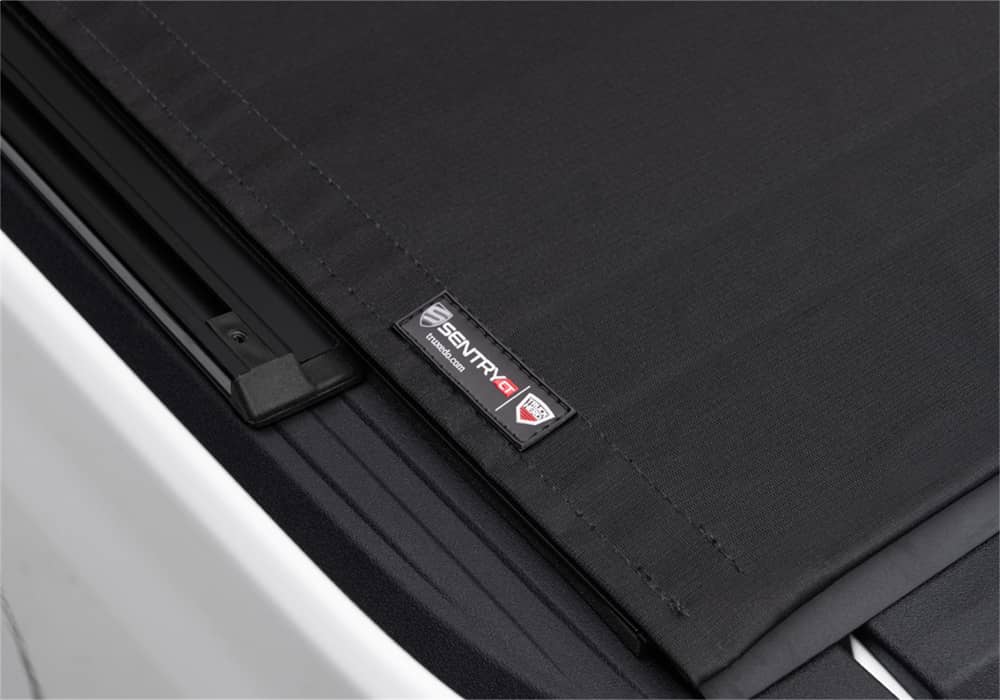 Truxedo SENTRY CT tonneau cover for 20-26 Gladiator pickup trucks, shown installed on a vehicle with sleek, durable design.
