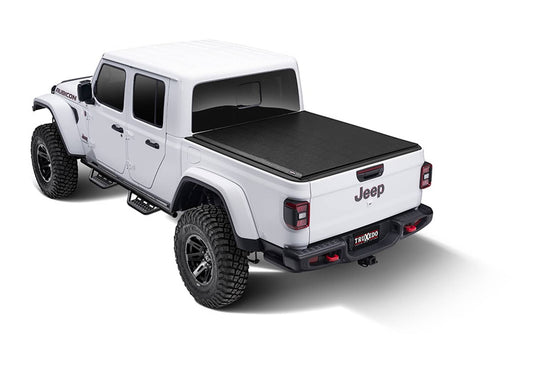 Truxedo LO PRO Box Cover for 20-26 Gladiator, a sleek tonneau cover installed on a pickup truck bed.