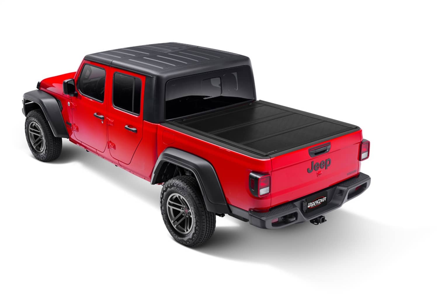 Undercover FLEX BOX CVR 20-26 Gladiator 5' tonneau cover installed on a pickup truck bed.