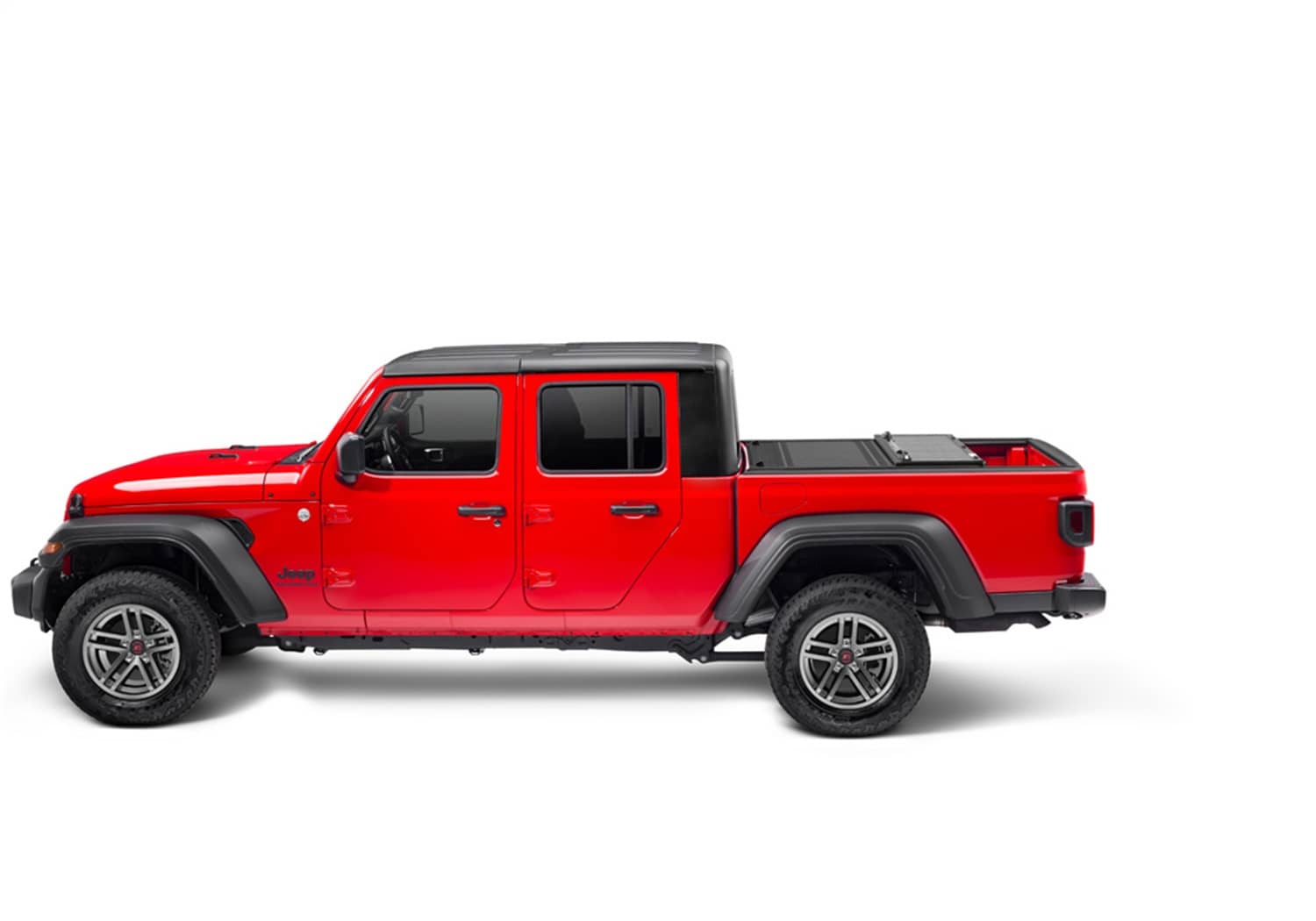 Undercover FLEX BOX CVR 20-26 Gladiator 5' tonneau cover installed on a truck bed, showcasing durable design and secure fit.