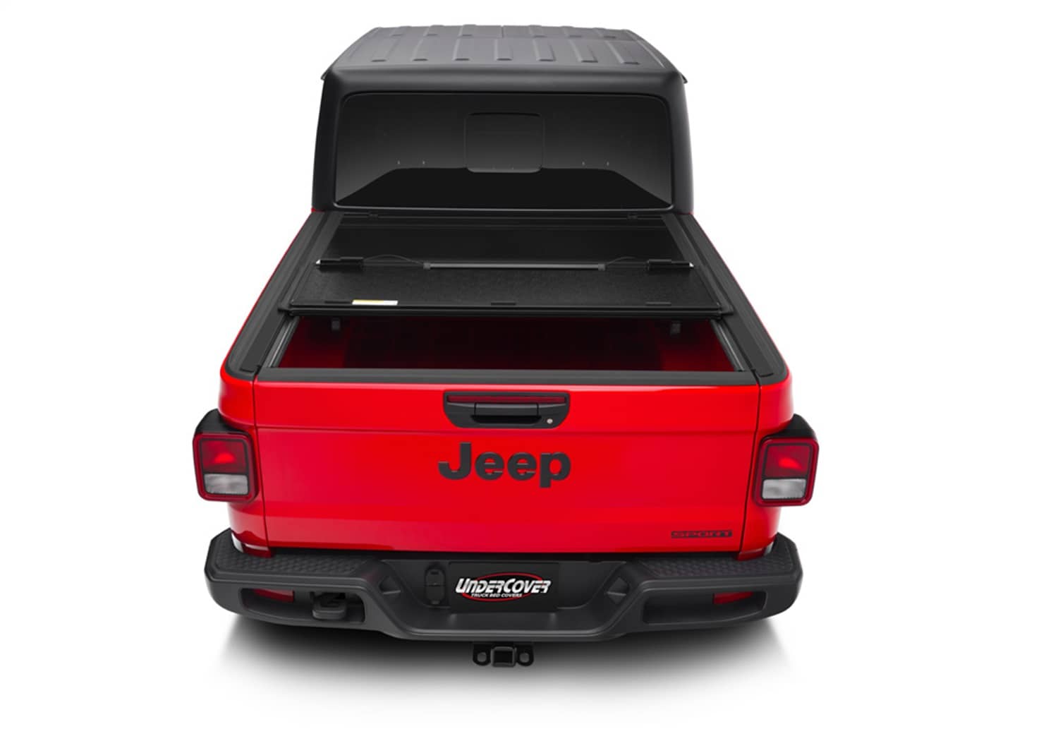 Undercover FLEX BOX CVR 20-26 Gladiator 5' tonneau cover installed on truck bed, showing durable black protective cover.