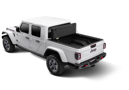 Undercover Ultra Flex Box CVR 20-26 Gladiator 5' tonneau cover installed on a pickup truck, showing its sleek, durable design.