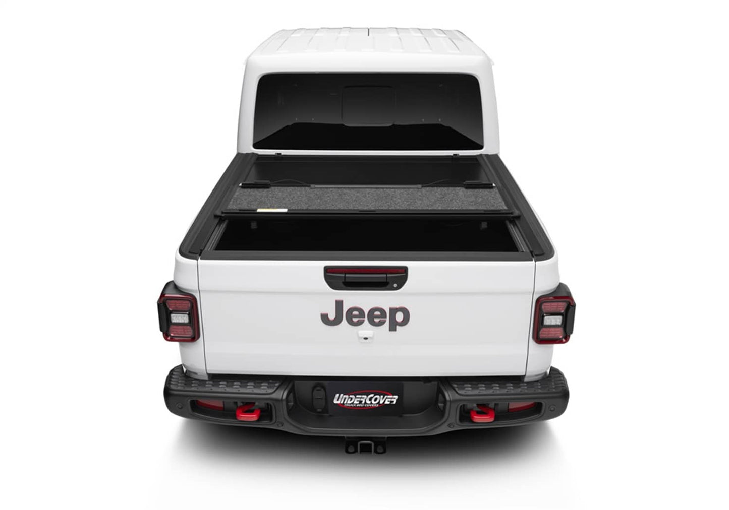Undercover Ultra Flex Box CVR 20-26 Gladiator 5' tonneau cover installed on truck bed, showcasing its sleek design and secure fit.