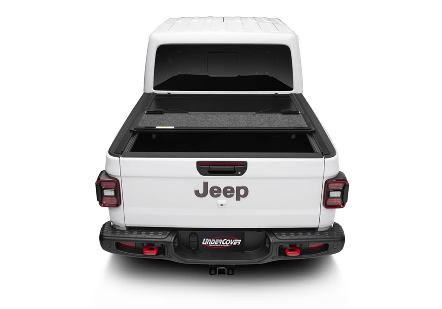 Undercover Ultra Flex Box CVR 20-26 Gladiator 5' tonneau cover installed on truck bed, showcasing its sleek design and secure fit.