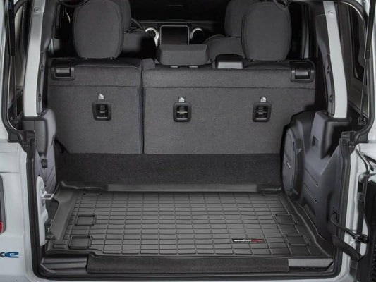 Weathertech cargo liner for 2021-2025 Jeep Wrangler 4xe, durable floor mat with textured surface and custom fit.
