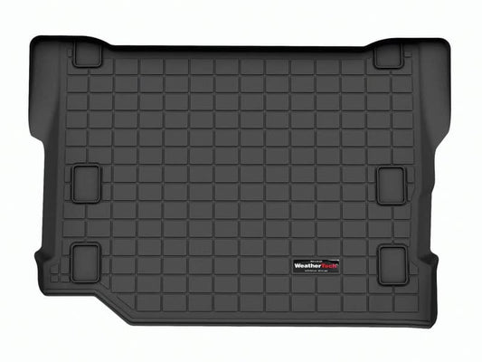 Weathertech black cargo liner for 24-25 Jeep Wrangler 4xe, durable floor mat with custom fit and textured surface.
