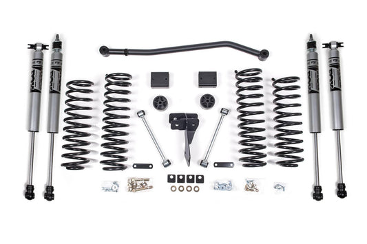 Zone Offroad 4-inch suspension lift kit with Fox 2.0 shocks for 2007-2011 Jeep Wrangler 4-door, showing installed lift components.