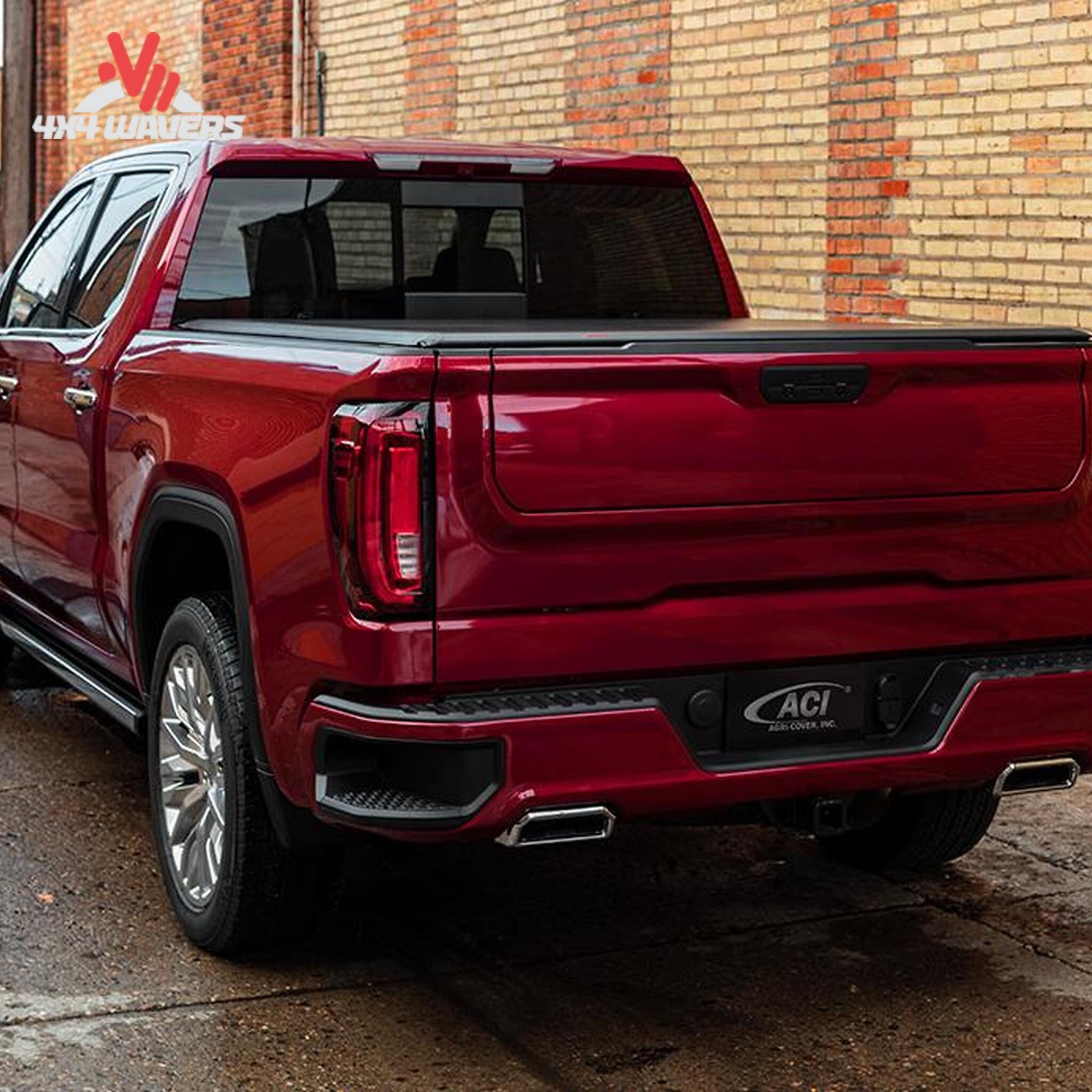 An ultra low profile 1 inch black vinyl soft roll up truck bed cover installed on a short box Ford F-150 Lightning SKU BGPC_41369.