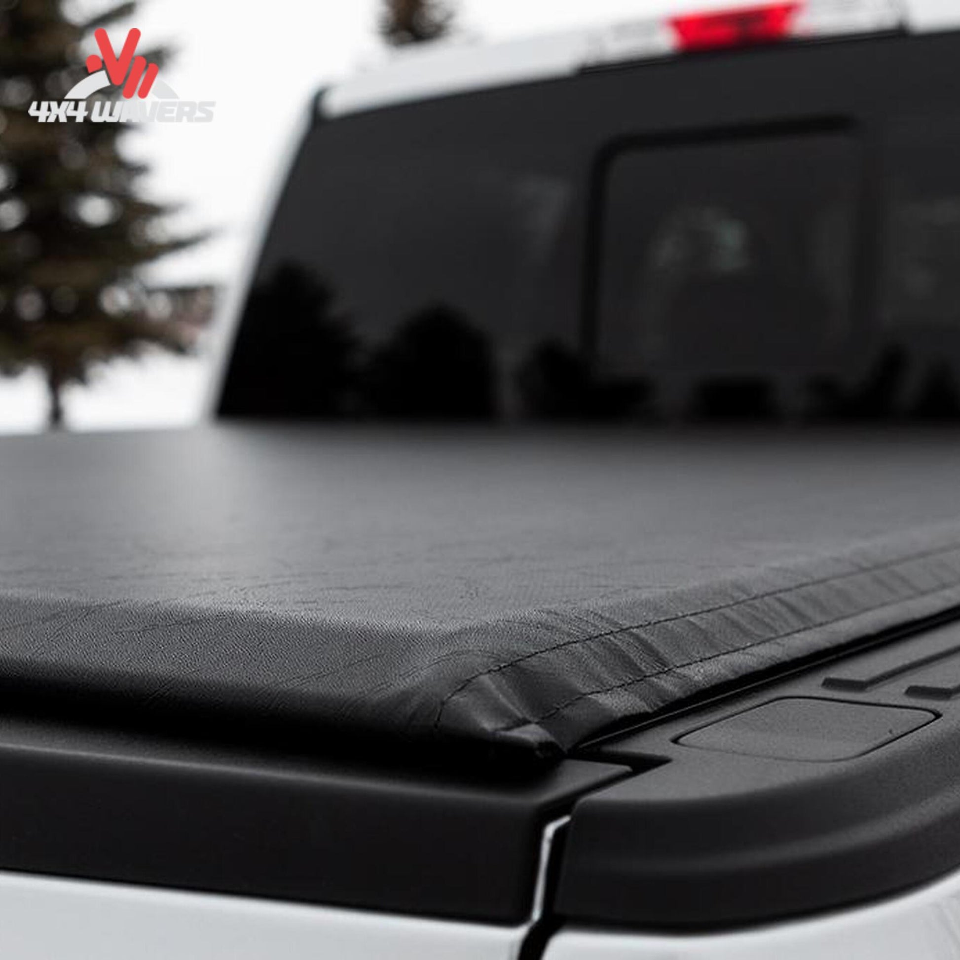 An ultra low profile 1 inch black vinyl soft roll up truck bed cover installed on a short box Ford F-150 Lightning SKU BGPC_41369.