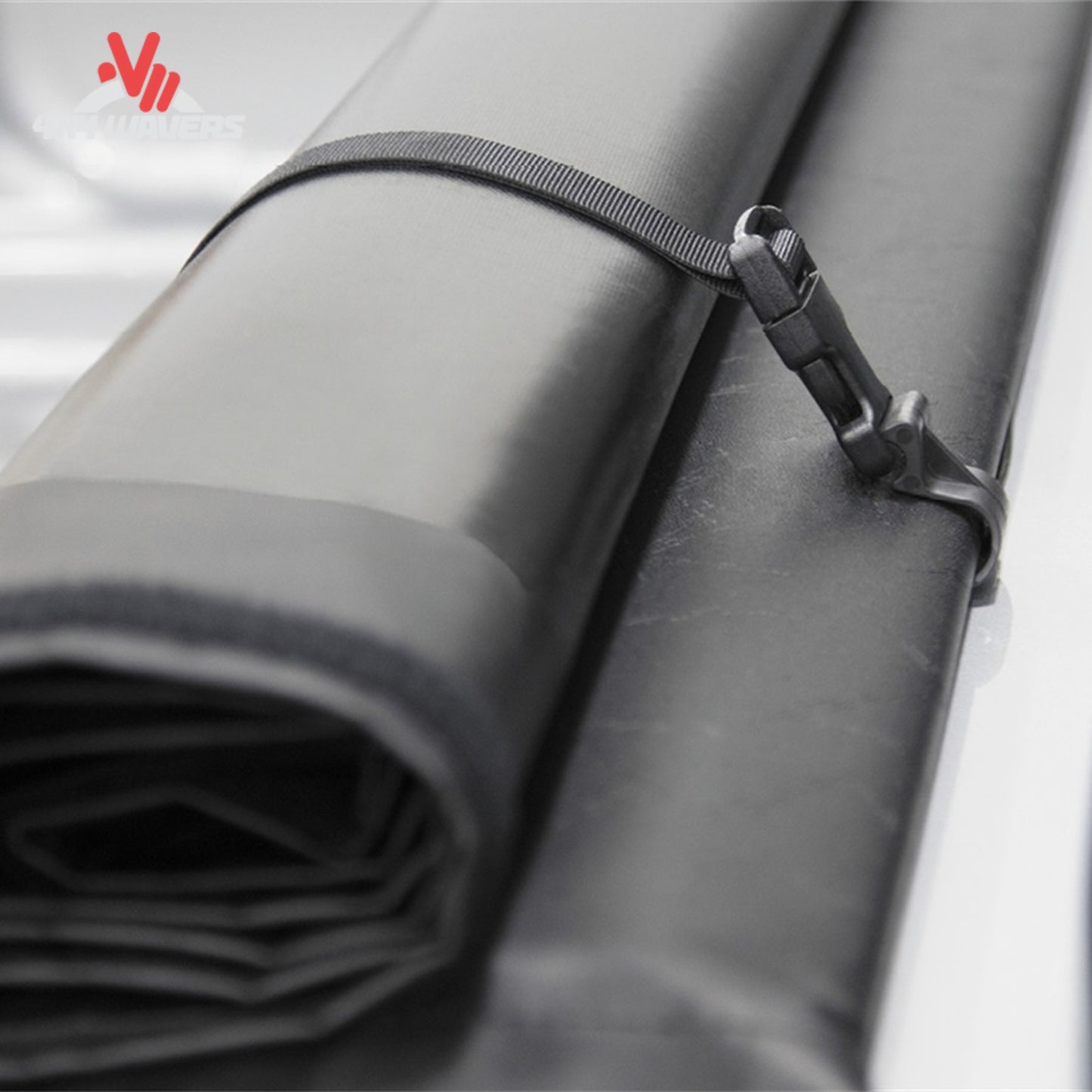A 5.5 foot soft vinyl tonneau cover completely rolled up behind the truck cab showing full open bed access SKU BGPC_41369.