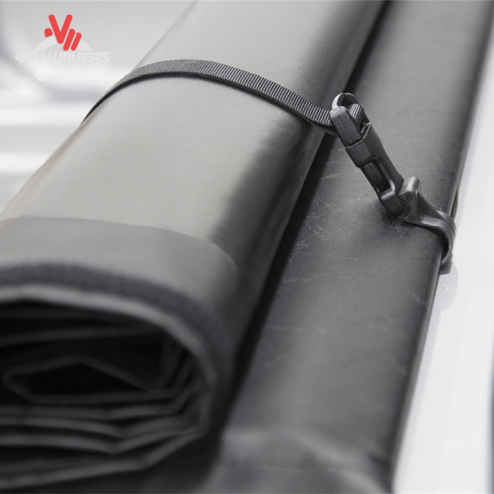 A 5.5 foot soft vinyl tonneau cover completely rolled up behind the truck cab showing full open bed access SKU BGPC_41369.