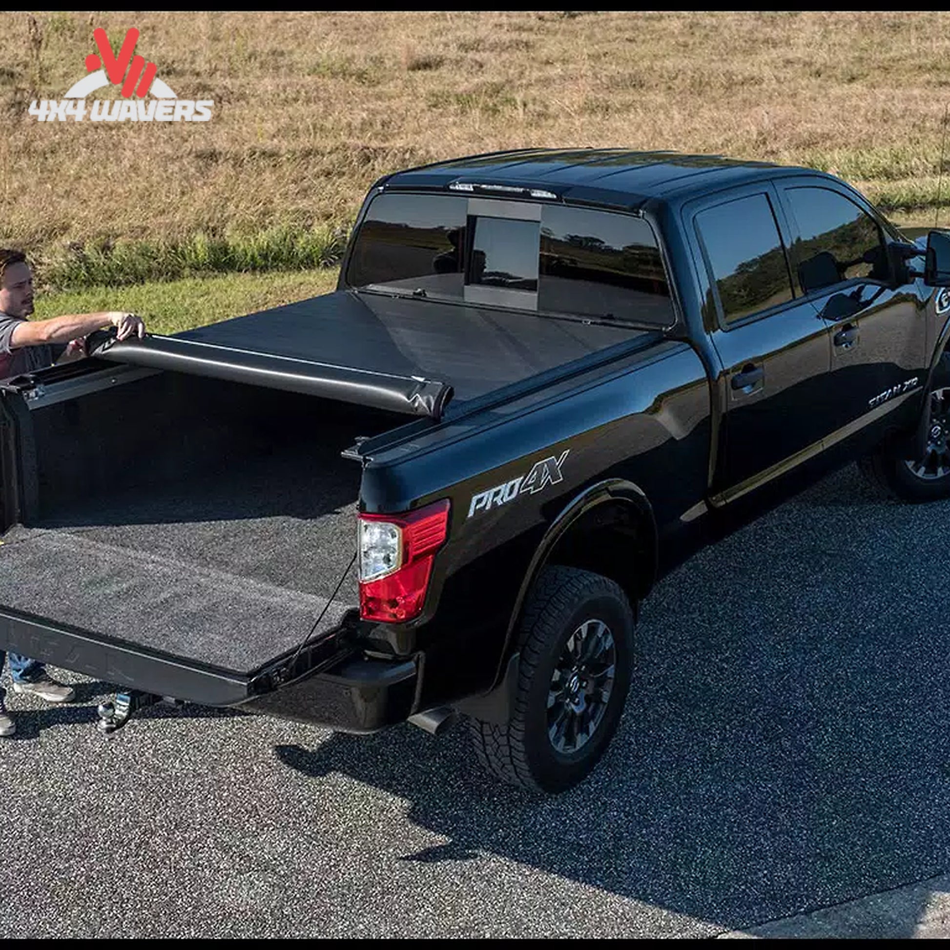 ACCESS roll up bed cover rolled completely forward to the cab with safety storage straps secured.