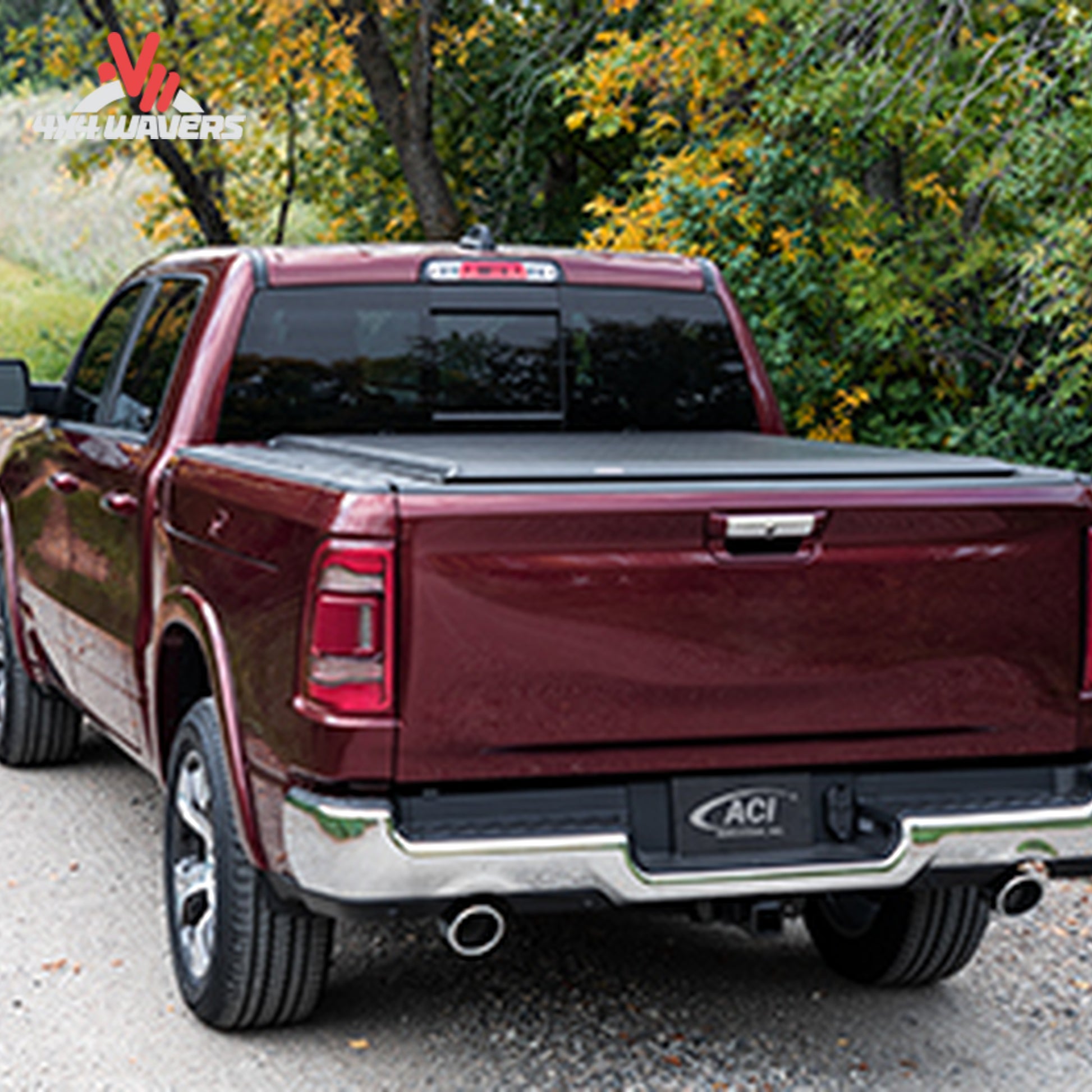 Closed black vinyl Access Original roll-up truck bed cover mounted on GMC Sierra SKU 12369