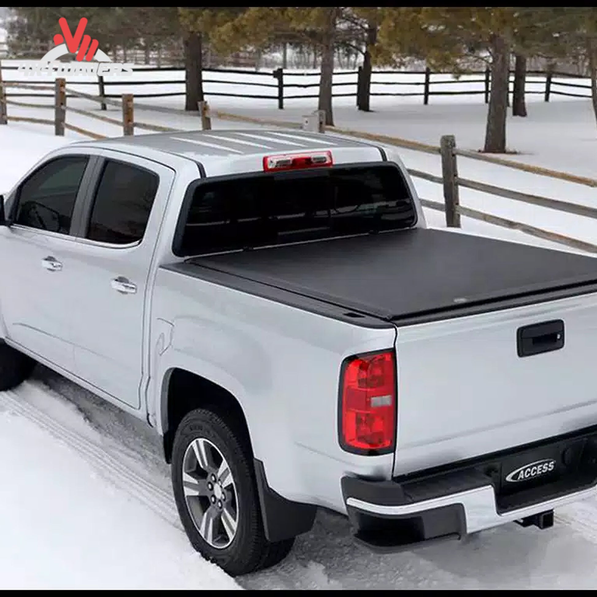 Close-up detail of the automated structural side latch system that secures the roll up tonneau cover near the tailgate.