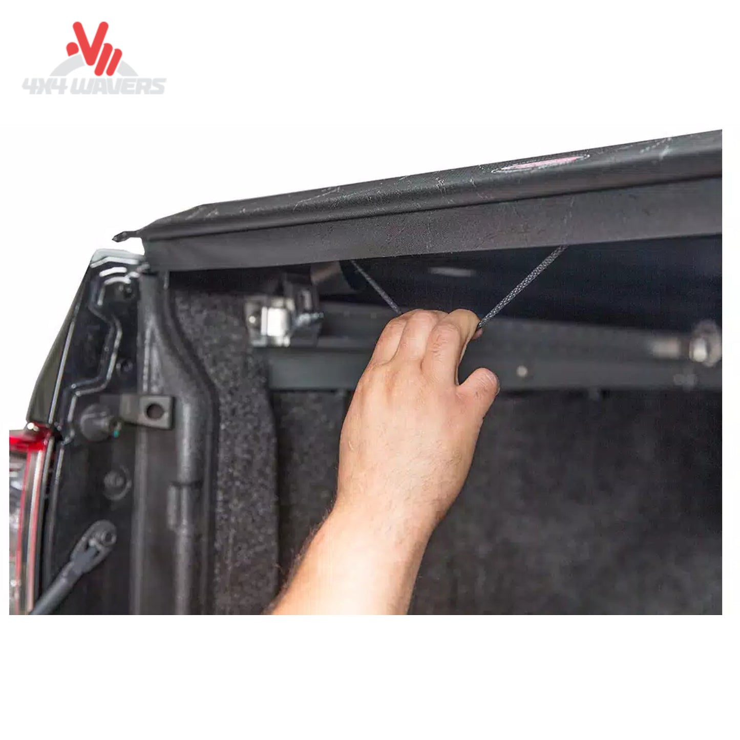 A close-up showing the manual dial tension adjustment mechanism to keep the soft vinyl cover tight in winter.