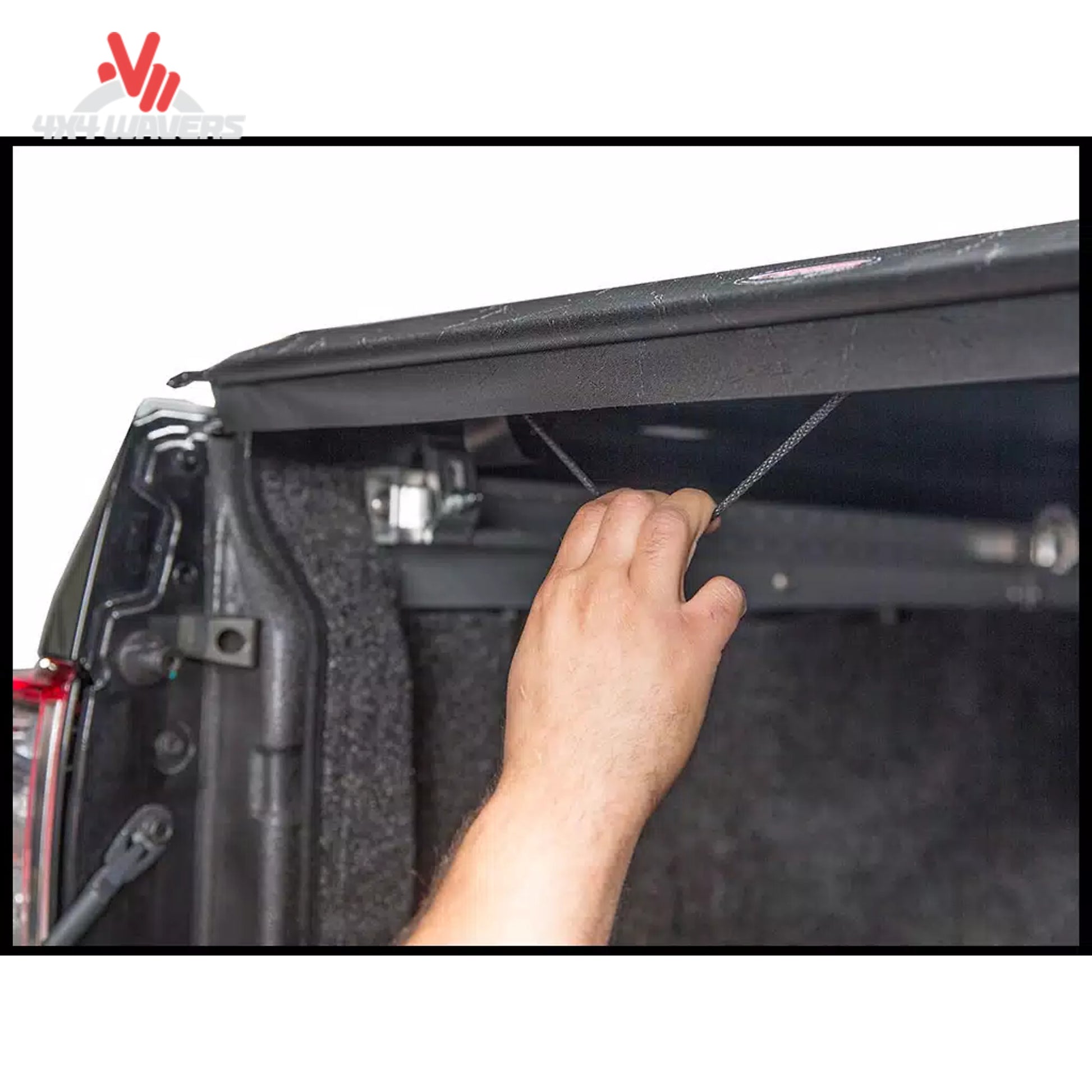 A close-up showing the manual dial tension adjustment mechanism to keep the soft vinyl cover tight in winter.