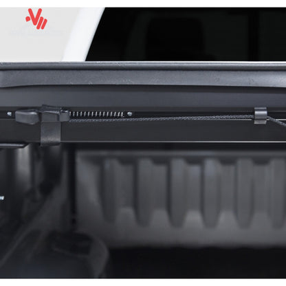 Close-up view of the dual automatic side latches securing the roll up cover near the truck tailgate SKU BGPC_61379.