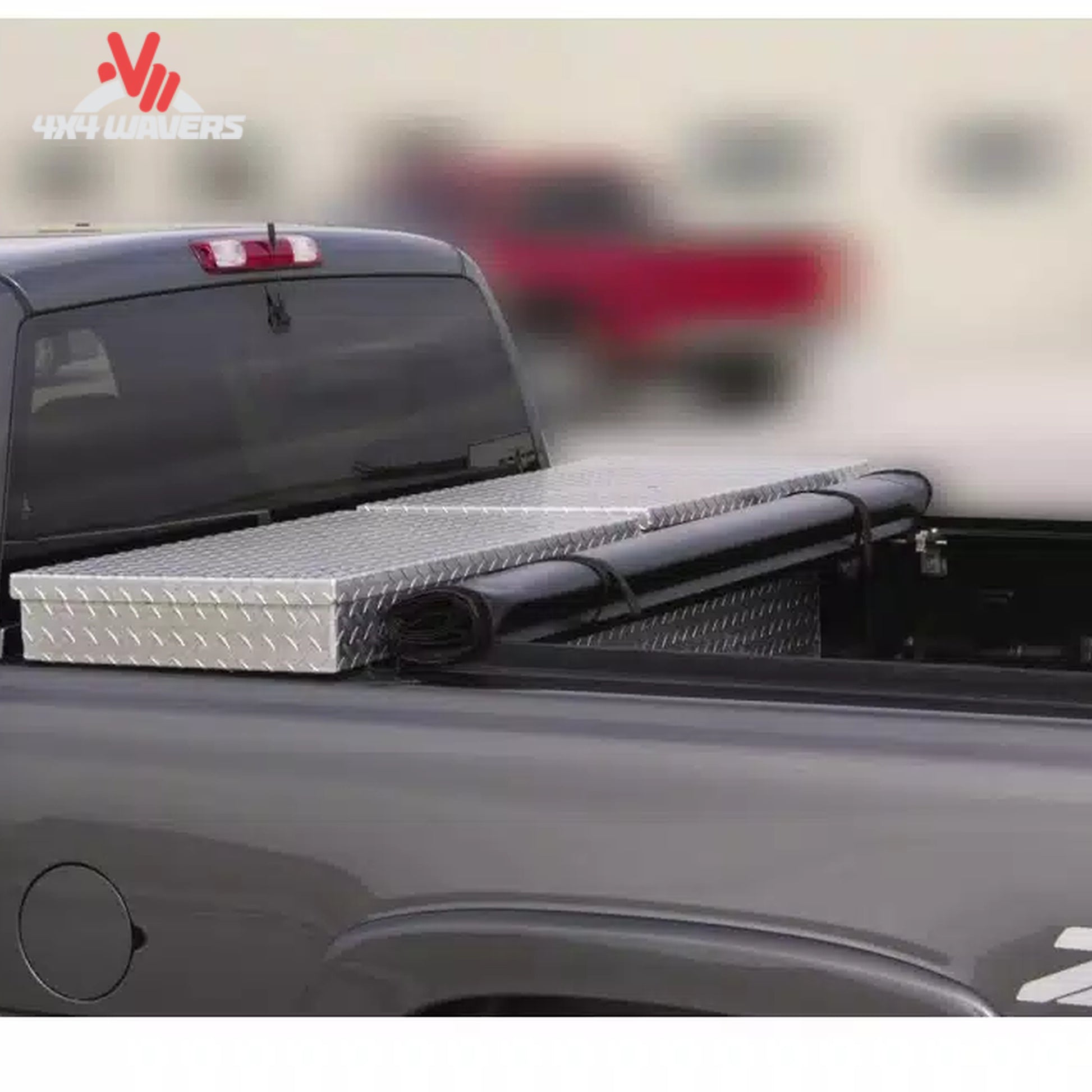 Close-up detail showing the aluminum header bar and foam gasket sealing the tonneau cover against the back of a metal crossover toolbox SKU BGPC_61389.