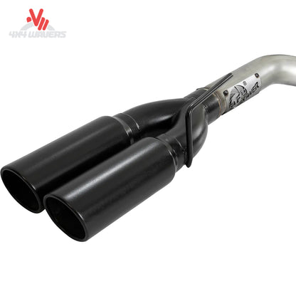 Close up of dual 4 inch mirror polished quad exhaust tips on Silverado bumper SKU 49-34102-P